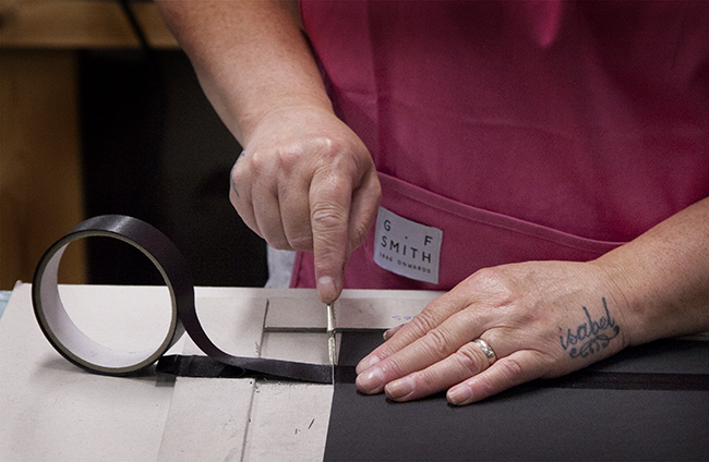 Photograph of someone working at G F Smith.