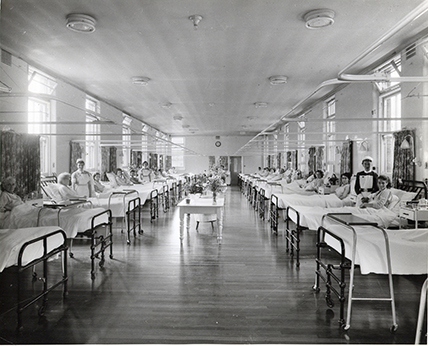 Photograph of a hospital ward from the 1950's.