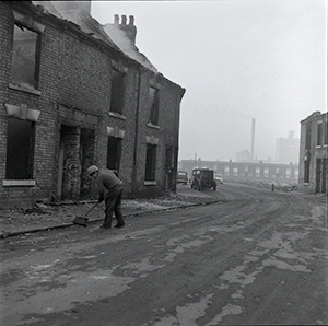 Photograph of houses in Hull being burned before demolition 1972,