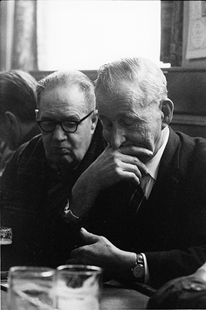 Photograph of people playing dominoes in pub in Hull 1970's.