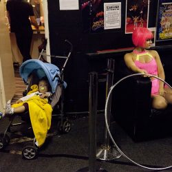 A backstage photograph at the Hippodrome Circus of a dancer and child.