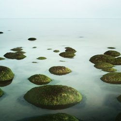 Photograph of rocks in the sea at Hunstanton.