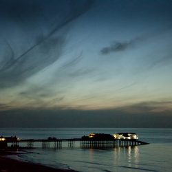 A photograph taken at dusk of the pier at Cromer Norfolk.