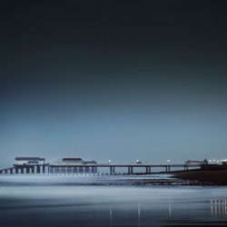 A photograph taken at dusk towards Cromer pier.