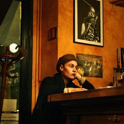 Photograph of a sad girl at the Cape Town bar in Milan