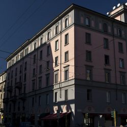 Colour photograph of apartments in Milan.