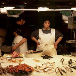 Photograph of a fishwife in Barcelona Fish Market.