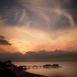 Colour photograph of a Turneresque sky Cromer