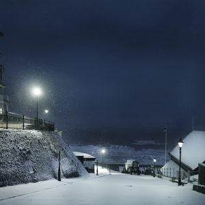 Colour photograph of snowfall on the Ganway Cromer, just before dawn.