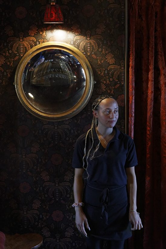 Photograph of a barmaid in The Suffield Arms Norfolk.