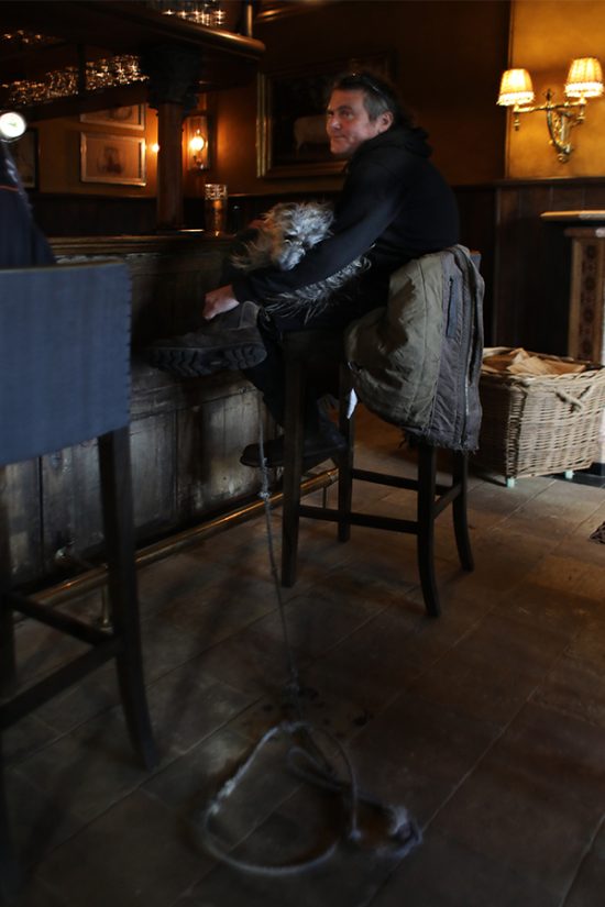 Photograph of a man with a dog Suffield Arms Norfolk